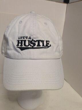 Life's A Hustle White Baseball Cap Normal Wear